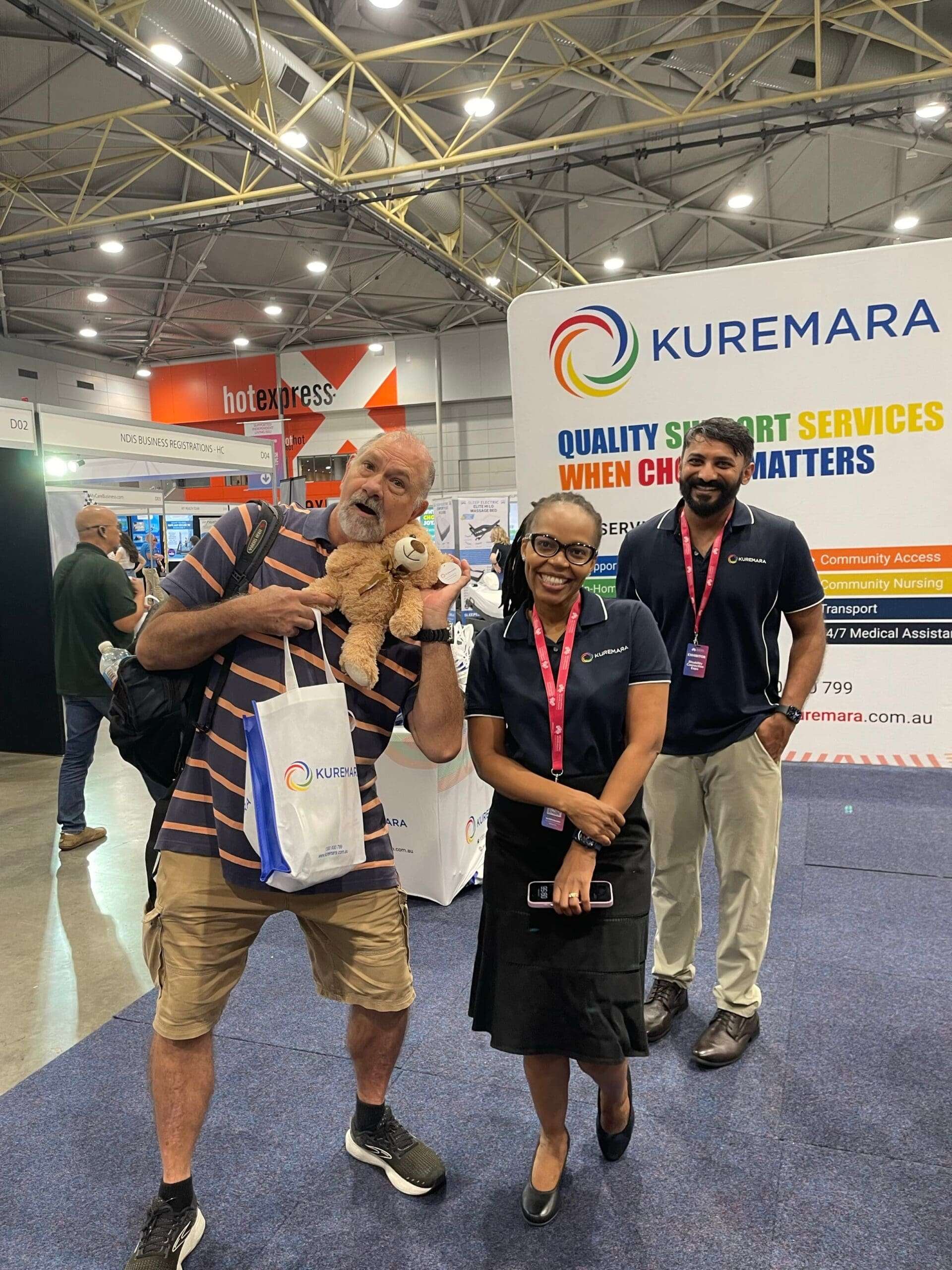 Happy Visitors Posing with Kuremara's Team at Brisbane Disability Connection Expo event 2025