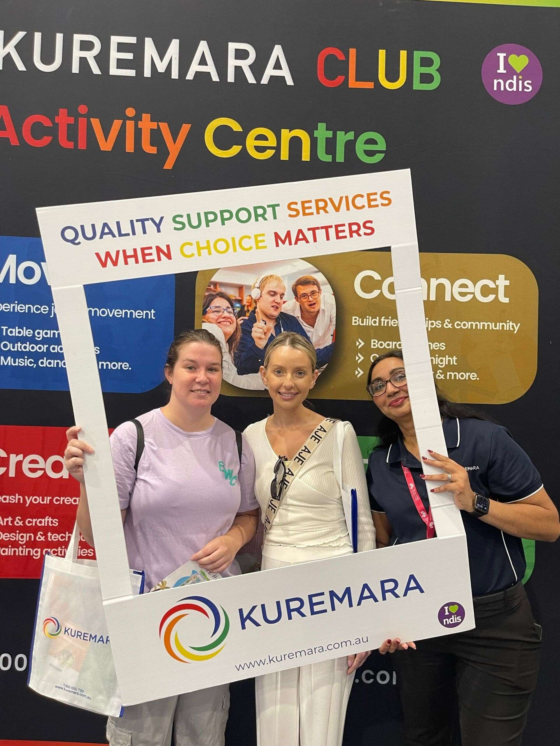 Visitors Posing with Photo Booth at Kuremara Stall in Brisbane Disability Connection Expo event 2025